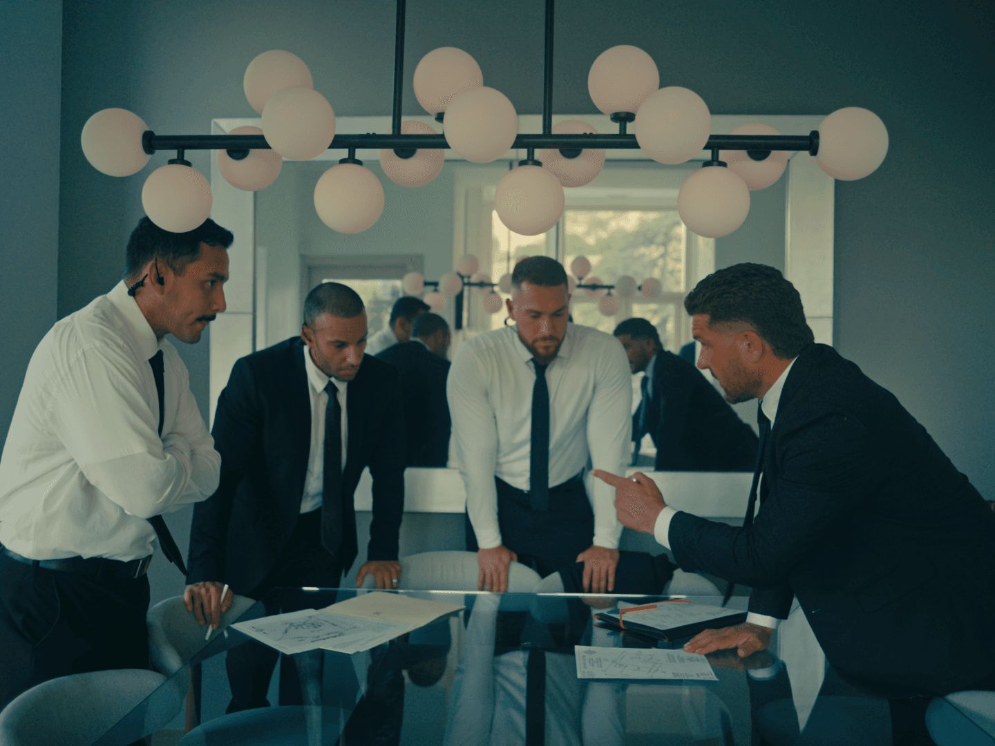 LDG team briefing around a table