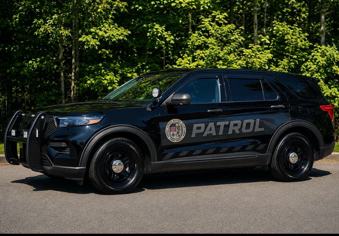Black LDG PATROL Ford Explorer with round seal on the door
