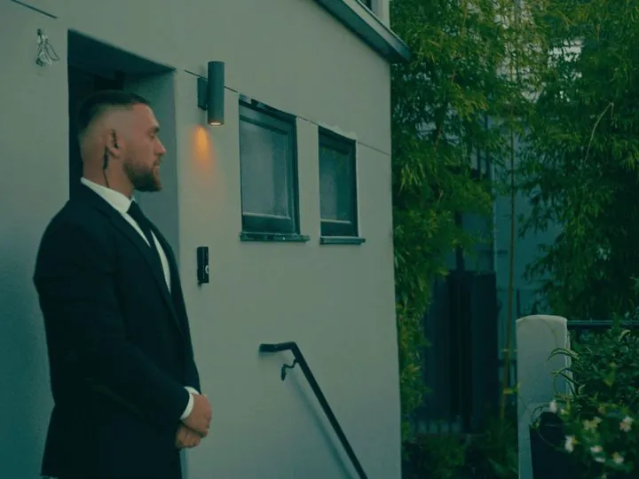 LDG security officer posted outside a residence