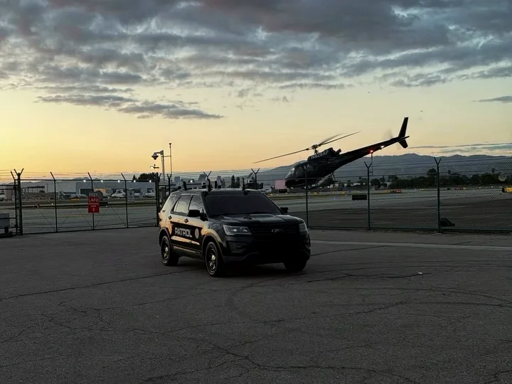 LDG patrol Ford Explorer with security cameras on all four roof corners