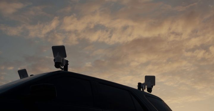 Roof-mounted security cameras on an LDG vehicle against an evening sky